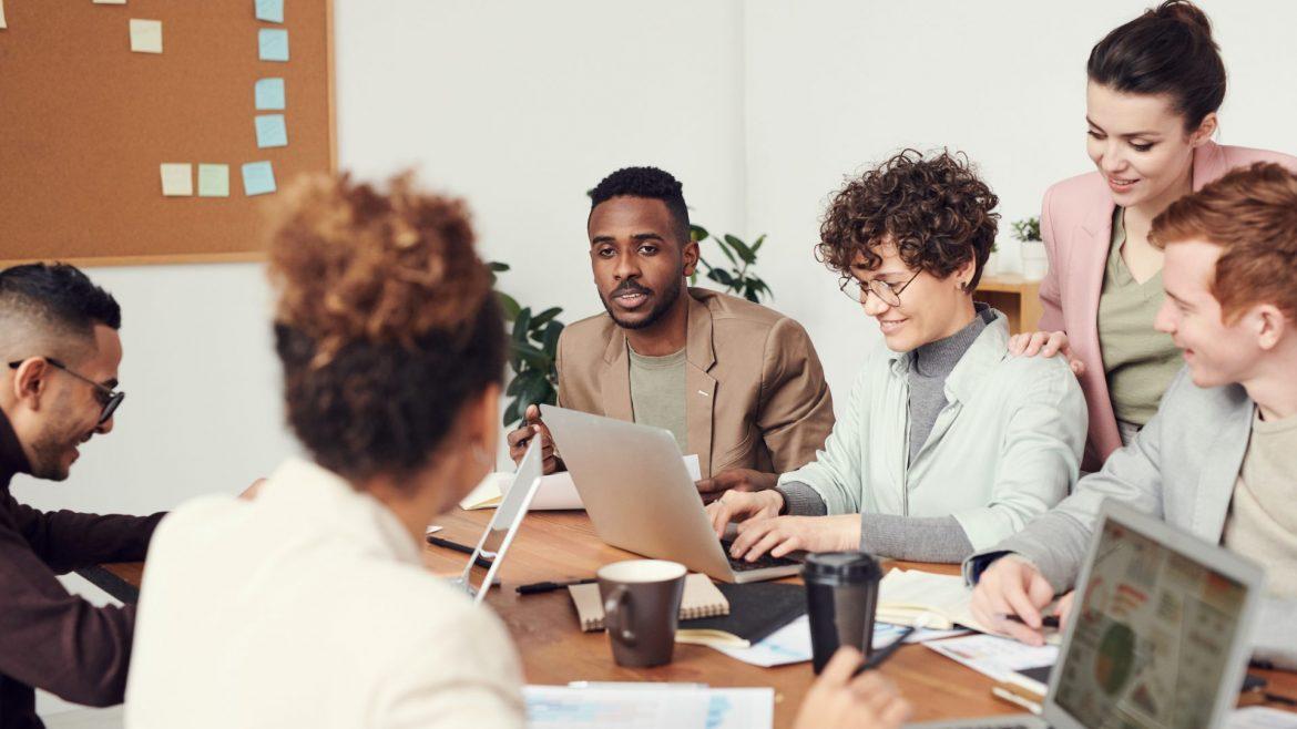 a group of people having a meeting