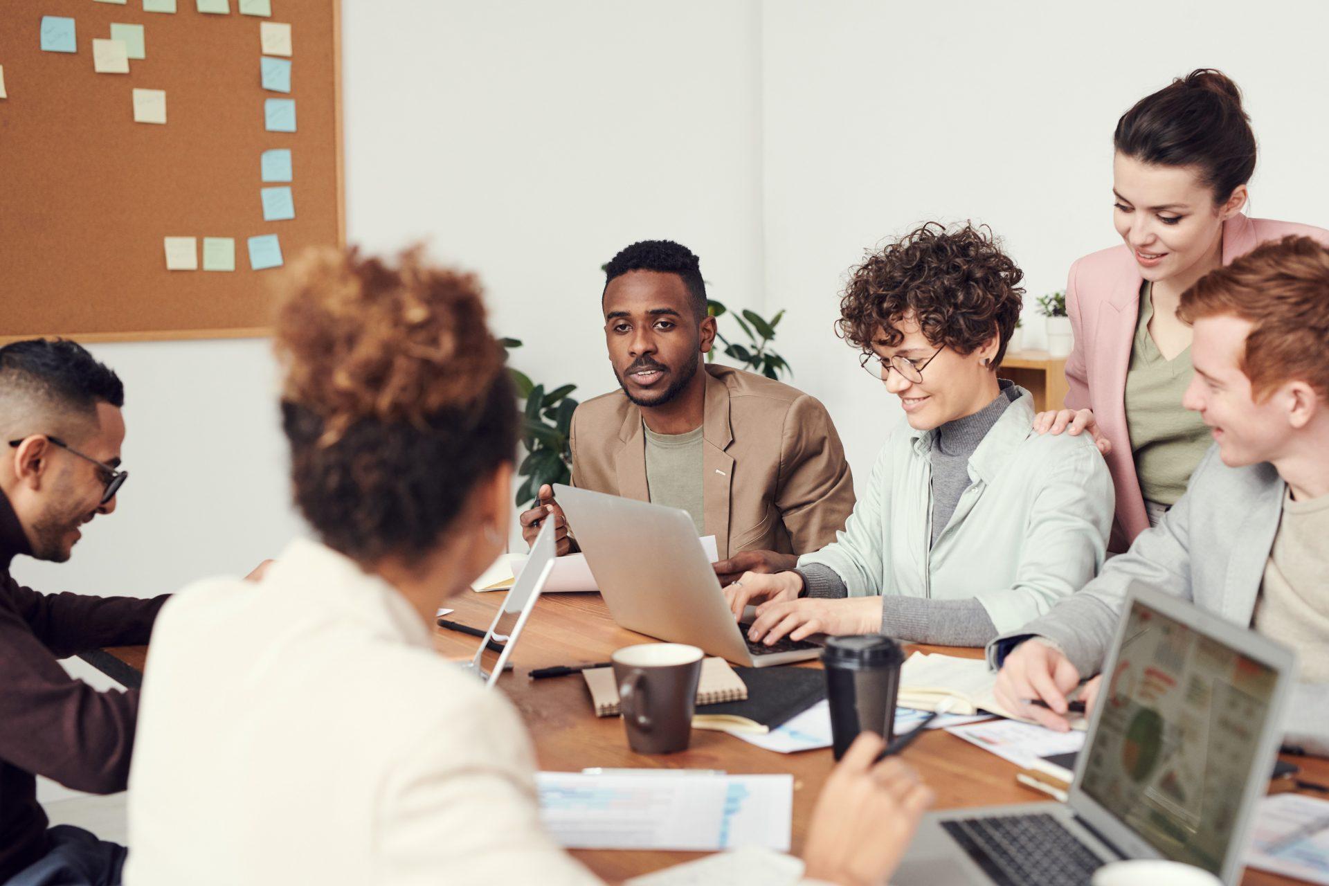 a group of people having a meeting